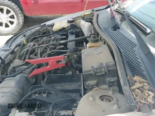 ✅ 2005 Ford Focus S • VIN: 3FAFP37N25R106472 • Лот: 42732410. Опубликован ранее на IAAI с пробегом 99 086 миль. Бесплатный доступ к архиву аукционных продаж из США и подробный отчёт об истории автомобиля на DreamBid. Изображение 19.