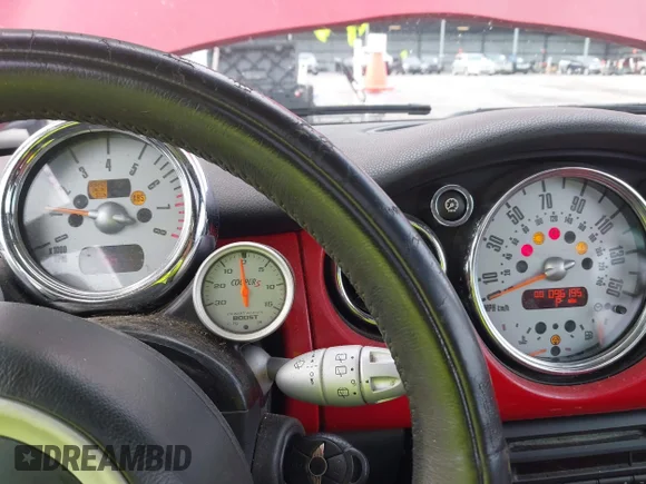✅ 2006 MINI Hardtop S • VIN: WMWRE33576TJ35157 • Лот: 42273131. Опубликован ранее на IAAI с пробегом 96 195 миль. Бесплатный доступ к архиву аукционных продаж из США и подробный отчёт об истории автомобиля на DreamBid. Изображение 7.