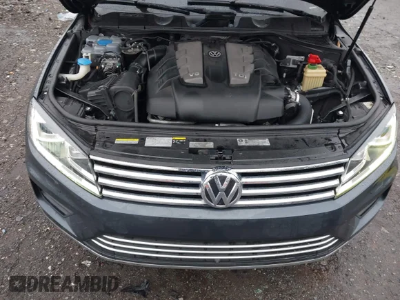 ✅ 2015 Volkswagen Touareg Sport • VIN: WVGEP9BP9FD003122 • Lot: 44150312. Wystawiony na IAAI z przebiegiem 151 454 mil. Bezpłatny archiwum sprzedaży aukcyjnych z USA i szczegółowy raport historii pojazdu na DreamBid. Zdjęcie 10.