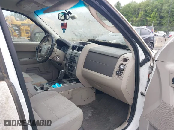✅ 2011 Ford Escape Hybrid • VIN: 1FMCU5K34BKC32657 • Лот: 42612685. Опубліковано раніше на IAAI з пробігом 253 664 миль. Безкоштовний доступ до архіву аукціонних продажів зі США та докладний звіт про історію автомобіля на DreamBid. Зображення 5.