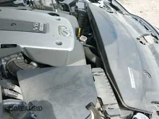 ✅ 2018 Infiniti Q70 Luxe • VIN: JN1BY1PP7JM330399 • Lot: 42028103. Listed on IAAI with 95,527 mi. Free auction sales archive from the USA and detailed vehicle history report at DreamBid. Image 19.