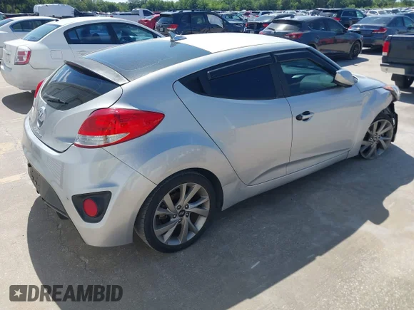 ✅ 2017 Hyundai Veloster • VIN: KMHTC6AD5HU310590 • Lot: 42069477. Wystawiony na IAAI z przebiegiem 113 331 mil. Bezpłatny archiwum sprzedaży aukcyjnych z USA i szczegółowy raport historii pojazdu na DreamBid. Zdjęcie 4.