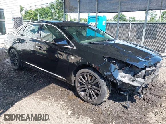 ✅ 2018 Cadillac XTS Luxury • VIN: 2G61M5S33J9118728 • Lot: 45410546. Listed on IAAI with 171,745 mi. Free auction sales archive from the USA and detailed vehicle history report at DreamBid. Image 1.