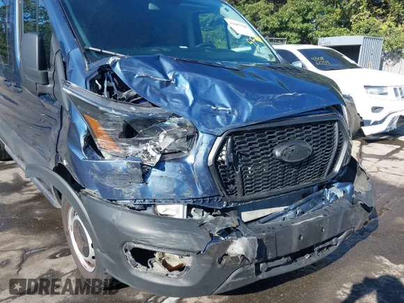 ✅ 2024 Ford Transit Cargo • VIN: 1FTYE1Y82RKA05660 • Лот: 43087529. Опубліковано раніше на IAAI з пробігом 9 822 миль. Безкоштовний доступ до архіву аукціонних продажів зі США та докладний звіт про історію автомобіля на DreamBid. Зображення 6.