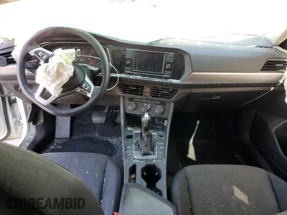 ✅ 2019 Volkswagen Jetta S • VIN: 3VWC57BU3KM238784 • Лот: 42925273. Опубликован ранее на Copart с пробегом 90 959 миль. Бесплатный доступ к архиву аукционных продаж из США и подробный отчёт об истории автомобиля на DreamBid. Изображение 8.