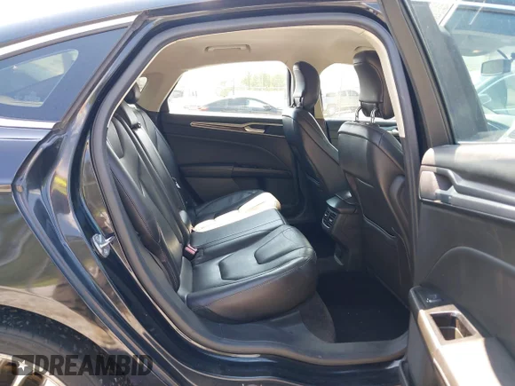 ✅ 2014 Ford Fusion Titanium • VIN: 3FA6P0K99ER358874 • Лот: 45541357. Опубликован ранее на IAAI с пробегом 270 640 миль. Бесплатный доступ к архиву аукционных продаж из США и подробный отчёт об истории автомобиля на DreamBid. Изображение 8.