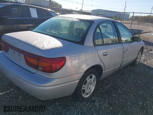 ✅ 2001 Saturn SL • VIN: 1G8ZK527X1Z269719 • Лот: 43501651. Опубликован ранее на IAAI с пробегом Не указан. Бесплатный доступ к архиву аукционных продаж из США и подробный отчёт об истории автомобиля на DreamBid. Изображение 4.