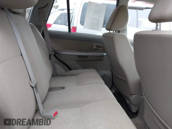 ✅ 2011 Suzuki Grand Vitara Premium • VIN: JS3TD0D27B4102454 • Lot: 43800556. Wystawiony na IAAI z przebiegiem 213 561 mil. Bezpłatny archiwum sprzedaży aukcyjnych z USA i szczegółowy raport historii pojazdu na DreamBid. Zdjęcie 8.