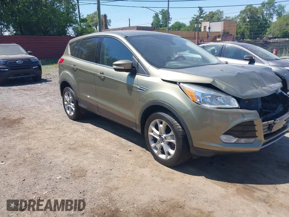 ✅ 2013 Ford Escape SEL • VIN: 1FMCU0HX2DUD67415 • Lot: 45270006. Wystawiony na IAAI z przebiegiem 75 316 mil. Bezpłatny archiwum sprzedaży aukcyjnych z USA i szczegółowy raport historii pojazdu na DreamBid. Zdjęcie 1.