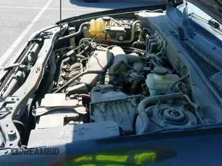 2006 Mercury Mariner Luxury z VIN 4M2YU56186DJ00220, wystawiony jako IAAI lot #42174056 z przebiegiem 208 820 mil mil oraz . Historia ofert i sprzedaży dostępna na DreamBid. Obrazek 12.