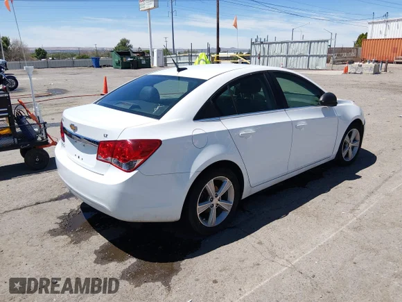 ✅ 2014 Chevrolet Cruze 2LT • VIN: 1G1PE5SB3E7181940 • Lot: 45084067. Listed on IAAI with 130,596 mi. Free auction sales archive from the USA and detailed vehicle history report at DreamBid. Image 4.