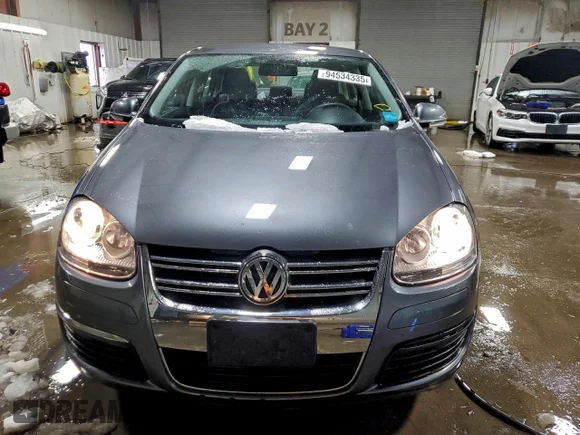 ✅ 2009 Volkswagen Jetta S • VIN: 3VWJM71K69M064956 • Лот: 94534335. Опубліковано раніше на Copart з пробігом 53 014 миль. Безкоштовний доступ до архіву аукціонних продажів зі США та докладний звіт про історію автомобіля на DreamBid. Зображення 5.