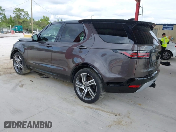 ✅ 2023 Land Rover Discovery Metropolitan Edition • VIN: SALRW4EU9P2467157 • Lot: 41203156. Listed on IAAI with 32,071 mi. Free auction sales archive from the USA and detailed vehicle history report at DreamBid. Image 3.