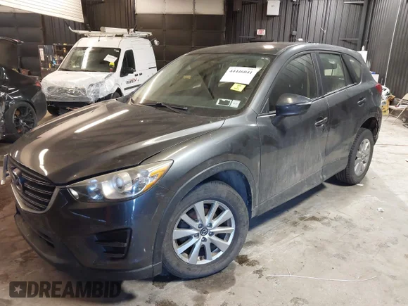 ✅ 2016 Mazda CX-5 Sport • VIN: JM3KE4BY6G0631812 • Lot: 44446041. Wystawiony na IAAI z przebiegiem 172 904 mil. Bezpłatny archiwum sprzedaży aukcyjnych z USA i szczegółowy raport historii pojazdu na DreamBid. Zdjęcie 2.