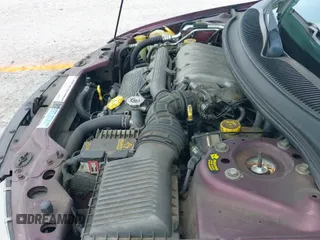 ✅ 2000 Chrysler Cirrus LXi • VIN: 1C3EJ56H4YN245352 • Lot: 42407272. Listed on IAAI with 86,654 mi. Free auction sales archive from the USA and detailed vehicle history report at DreamBid. Image 12.