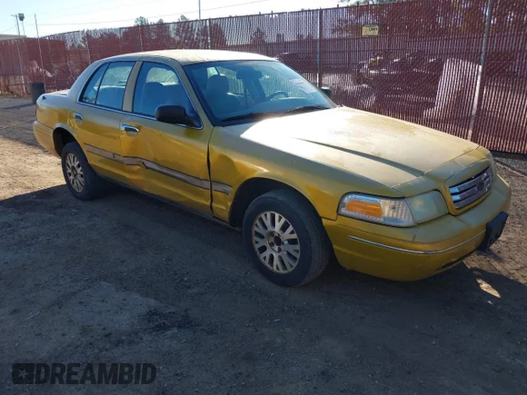 ✅ 2005 Ford Crown Victoria LX • VIN: 2FAFP74W85X135996 • Lot: 43599092. Wystawiony na IAAI z przebiegiem 320 330 mil. Bezpłatny archiwum sprzedaży aukcyjnych z USA i szczegółowy raport historii pojazdu na DreamBid. Zdjęcie 1.