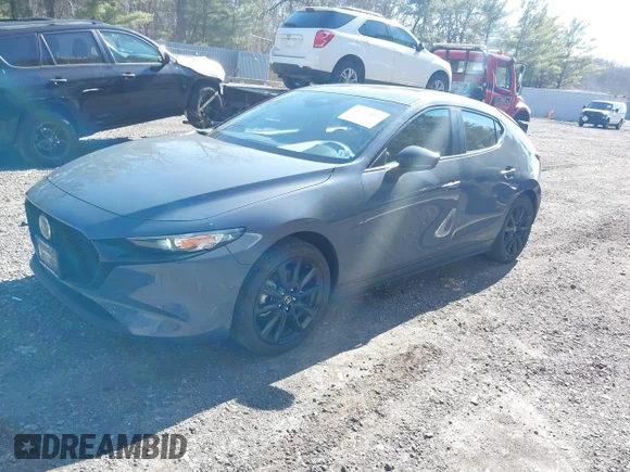✅ 2025 Mazda 3 S Carbon Edition • VIN: JM1BPBLM9S1757295 • Lot: 41772054. Listed on IAAI with 2,527 mi. Free auction sales archive from the USA and detailed vehicle history report at DreamBid. Image 2.