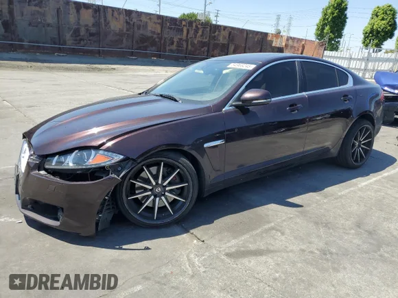 ✅ 2015 Jaguar XF Portfolio • VIN: SAJWA0F79F8U60216 • Lot: 54969245. Listed on Copart with 88,954 mi. Free auction sales archive from the USA and detailed vehicle history report at DreamBid. Image 1.