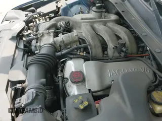 ✅ 2000 Jaguar S-Type V6 • VIN: SAJDA01C1YFL11762 • Lot: 43124123. Wystawiony na IAAI z przebiegiem 115 177 mil. Bezpłatny archiwum sprzedaży aukcyjnych z USA i szczegółowy raport historii pojazdu na DreamBid. Zdjęcie 14.