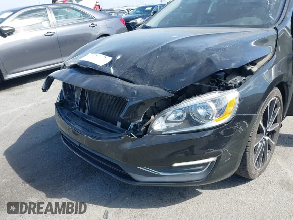 ✅ 2016 Volvo S60 T5 Drive-E Premier • VIN: YV126MFK4G2410882 • Lot: 41678078. Listed on IAAI with 125,507 mi. Free auction sales archive from the USA and detailed vehicle history report at DreamBid. Image 6.