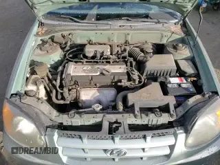 2003 Hyundai Accent GL z VIN KMHCG35CX3U242848, wystawiony jako Copart lot #86558394 z przebiegiem 56 248 mil mil oraz Szkoda całkowita • Salvage title. Historia ofert i sprzedaży dostępna na DreamBid. Obrazek 13.