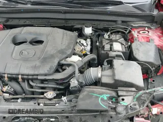 ✅ 2023 Mazda CX-30 S Premium • VIN: 3MVDMBDM3PM511402 • Lot: 42180001. Listed on IAAI with 6,189 mi. Free auction sales archive from the USA and detailed vehicle history report at DreamBid. Image 25.