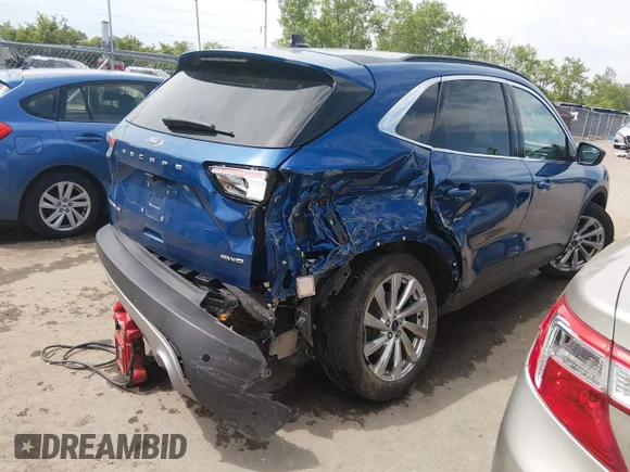 ✅ 2022 Ford Escape Titanium • VIN: 1FMCU9J90NUA76672 • Lot: 45191968. Wystawiony na IAAI z przebiegiem 60 003 mil. Bezpłatny archiwum sprzedaży aukcyjnych z USA i szczegółowy raport historii pojazdu na DreamBid. Zdjęcie 4.