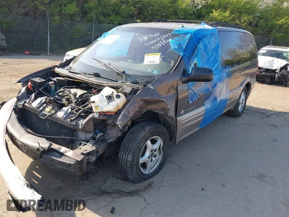 ✅ 2001 Pontiac Montana • VIN: 1GMDX03EX1D172241 • Lot: 44832371. Wystawiony na IAAI z przebiegiem 132 895 mil. Bezpłatny archiwum sprzedaży aukcyjnych z USA i szczegółowy raport historii pojazdu na DreamBid. Zdjęcie 2.