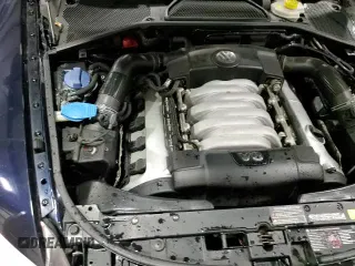 ✅ 2004 Volkswagen Phaeton V8 • VIN: WVWAF63D148009799 • Лот: 84174554. Опубликован ранее на Copart с пробегом 130 548 миль. Бесплатный доступ к архиву аукционных продаж из США и подробный отчёт об истории автомобиля на DreamBid. Изображение 14.