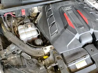 ✅ 2021 Audi SQ7 Prestige • VIN: WA1VWBF7XMD015487 • Лот: 84467835. Опубликован ранее на Copart с пробегом 76 133 миль. Бесплатный доступ к архиву аукционных продаж из США и подробный отчёт об истории автомобиля на DreamBid. Изображение 14.