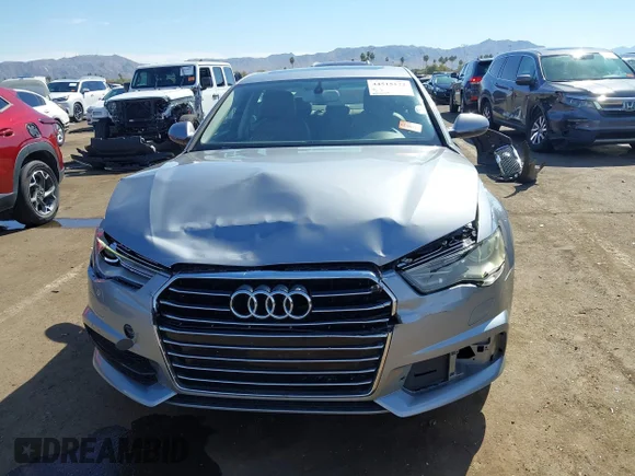 ✅ 2018 Audi A6 Premium • VIN: WAUC8AFC6JN041814 • Lot: 44515122. Wystawiony na IAAI z przebiegiem 94 944 mil. Bezpłatny archiwum sprzedaży aukcyjnych z USA i szczegółowy raport historii pojazdu na DreamBid. Zdjęcie 6.