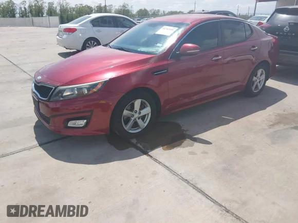 ✅ 2015 Kia Optima LX • VIN: 5XXGM4A70FG428132 • Lot: 44765106. Listed on IAAI with 121,444 mi. Free auction sales archive from the USA and detailed vehicle history report at DreamBid. Image 2.