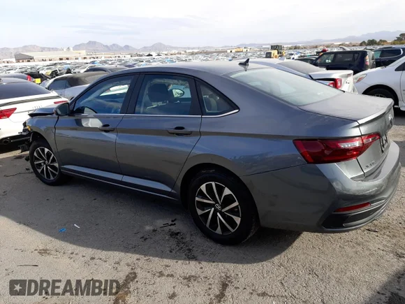 ✅ 2022 Volkswagen Jetta S • VIN: 3VWCM7BUXNM017285 • Lot: 69524182. Wystawiony na Copart z przebiegiem 4 258 mil. Bezpłatny archiwum sprzedaży aukcyjnych z USA i szczegółowy raport historii pojazdu na DreamBid. Zdjęcie 2.