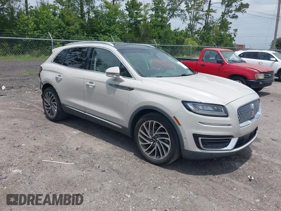 ✅ 2019 Lincoln Nautilus Reserve • VIN: 2LMPJ6L91KBL17022 • Лот: 45289652. Опубликован ранее на IAAI с пробегом 71 986 миль. Бесплатный доступ к архиву аукционных продаж из США и подробный отчёт об истории автомобиля на DreamBid. Изображение 1.