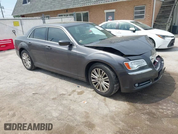 ✅ 2013 Chrysler 300 • VIN: 2C3CCARG0DH592192 • Lot: 45176457. Listed on IAAI with 162,602 mi. Free auction sales archive from the USA and detailed vehicle history report at DreamBid. Image 1.