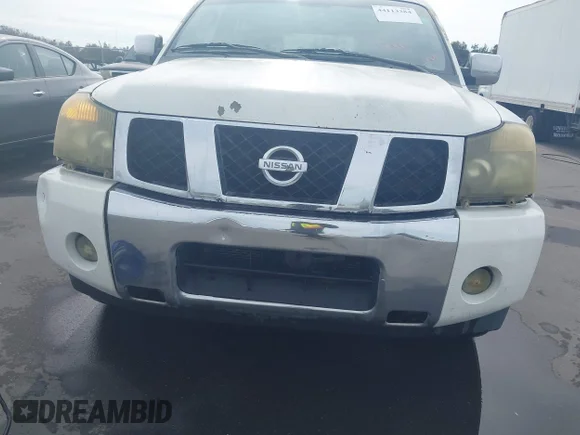 ✅ 2006 Nissan Armada LE • VIN: 5N1AA08A86N713363 • Lot: 44113384. Wystawiony na IAAI z przebiegiem 293 643 mil. Bezpłatny archiwum sprzedaży aukcyjnych z USA i szczegółowy raport historii pojazdu na DreamBid. Zdjęcie 6.