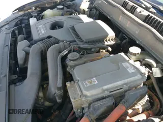 ✅ 2013 Ford Fusion Titanium Hybrid • VIN: 3FA6P0RU6DR344598 • Лот: 43531118. Опубликован ранее на IAAI с пробегом 354 745 миль. Бесплатный доступ к архиву аукционных продаж из США и подробный отчёт об истории автомобиля на DreamBid. Изображение 13.