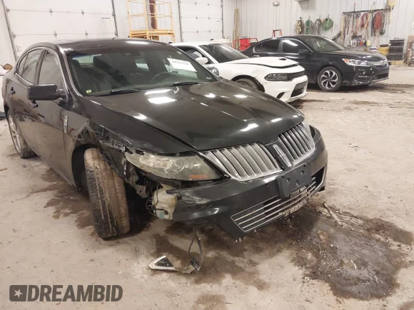 ✅ 2011 Lincoln MKS EcoBoost • VIN: 1LNHL9FT2BG613050 • Lot: 44501528. Listed on IAAI with 170,420 mi. Free auction sales archive from the USA and detailed vehicle history report at DreamBid. Image 1.