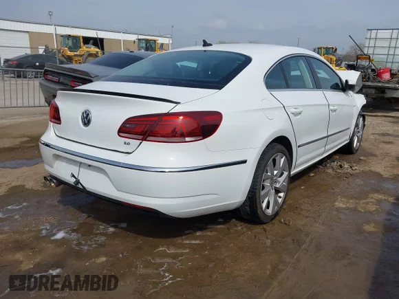 ✅ 2014 Volkswagen CC Sport • VIN: WVWAN7AN0EE530035 • Lot: 41921473. Wystawiony na IAAI z przebiegiem 110 432 mil. Bezpłatny archiwum sprzedaży aukcyjnych z USA i szczegółowy raport historii pojazdu na DreamBid. Zdjęcie 4.