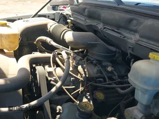 2002 Dodge 1500 ST z VIN 1D3HA18Z02J210613, wystawiony jako IAAI lot #41607497 z przebiegiem 196 935 mil mil oraz . Historia ofert i sprzedaży dostępna na DreamBid. Obrazek 12.