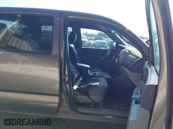 ✅ 2014 Toyota Tacoma • VIN: 5TFJX4CN4EX039669 • Lot: 43412748. Wystawiony na IAAI z przebiegiem 171 537 mil. Bezpłatny archiwum sprzedaży aukcyjnych z USA i szczegółowy raport historii pojazdu na DreamBid. Zdjęcie 5.