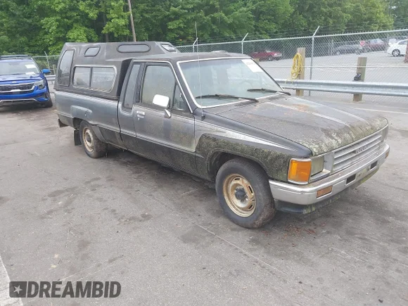 ✅ 1987 Toyota Pickup • VIN: JT4RN70D7H0032802 • Лот: 42205828. Опубликован ранее на IAAI с пробегом 340 768 миль. Бесплатный доступ к архиву аукционных продаж из США и подробный отчёт об истории автомобиля на DreamBid. Изображение 1.