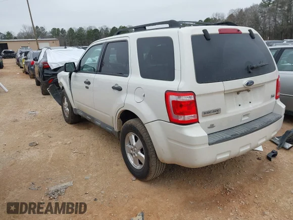 ✅ 2010 Ford Escape XLT • VIN: 1FMCU0DG7AKB63030 • Lot: 44515508. Wystawiony na IAAI z przebiegiem 104 722 mil. Bezpłatny archiwum sprzedaży aukcyjnych z USA i szczegółowy raport historii pojazdu na DreamBid. Zdjęcie 3.