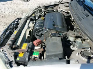 ✅ 2003 Toyota Corolla CE • VIN: 1NXBR32EX3Z066895 • Lot: 43239833. Listed on IAAI with 284,836 mi. Free auction sales archive from the USA and detailed vehicle history report at DreamBid. Image 12.