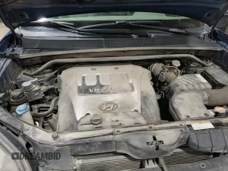 2005 Hyundai Tucson GLS z VIN KM8JN72D15U141766, wystawiony jako Copart lot #80990424 z przebiegiem 158 819 mil mil oraz Szkoda całkowita • Salvage title. Historia ofert i sprzedaży dostępna na DreamBid. Obrazek 14.