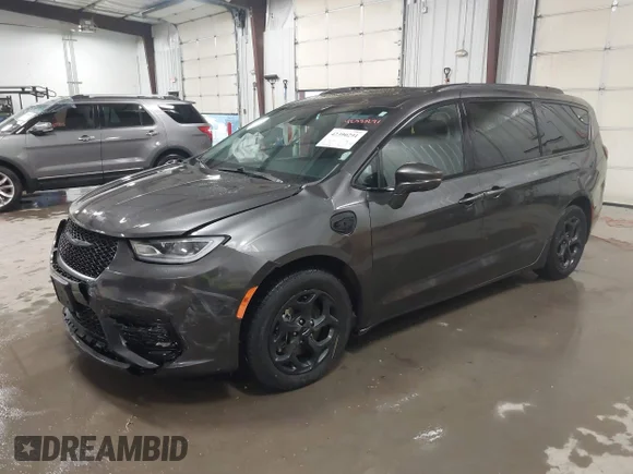 ✅ 2021 Chrysler Pacifica Hybrid Limited • VIN: 2C4RC1S77MR517581 • Lot: 42390291. Listed on IAAI with 64,098 mi. Free auction sales archive from the USA and detailed vehicle history report at DreamBid. Image 2.