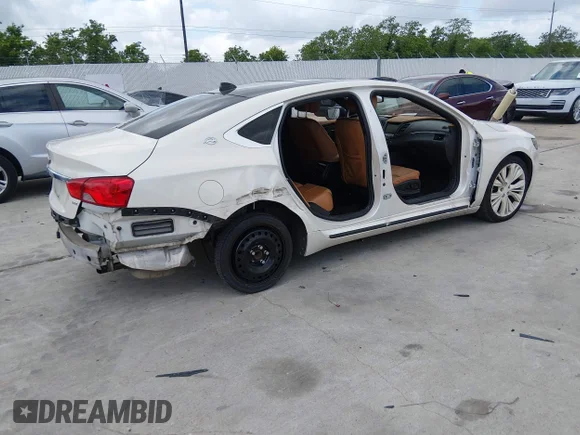 ✅ 2014 Chevrolet Impala LTZ • VIN: 1G1155S36EU132697 • Lot: 44863046. Listed on IAAI with 136,545 mi. Free auction sales archive from the USA and detailed vehicle history report at DreamBid. Image 4.
