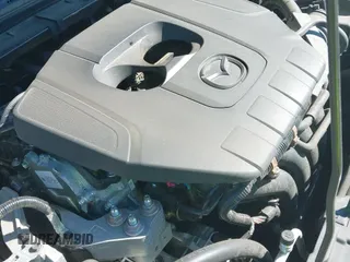 ✅ 2024 Mazda 3 S Carbon Edition • VIN: JM1BPBLMXR1709671 • Lot: 43016213. Wystawiony na IAAI z przebiegiem 41 648 mil. Bezpłatny archiwum sprzedaży aukcyjnych z USA i szczegółowy raport historii pojazdu na DreamBid. Zdjęcie 19.