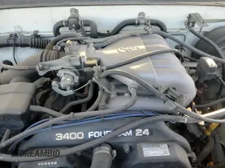 ✅ 1997 Toyota T100 SR5 • VIN: JT4UN24D4V0049432 • Лот: 83629774. Опубликован ранее на Copart с пробегом 208 803 миль. Бесплатный доступ к архиву аукционных продаж из США и подробный отчёт об истории автомобиля на DreamBid. Изображение 13.