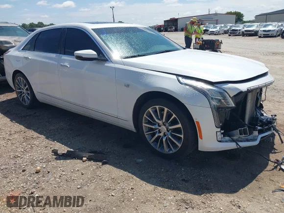 ✅ 2018 Cadillac CT6 Luxury AWD • VIN: 1G6KD5RSXJU106273 • Lot: 44991693. Listed on IAAI with 141,289 mi. Free auction sales archive from the USA and detailed vehicle history report at DreamBid. Image 1.